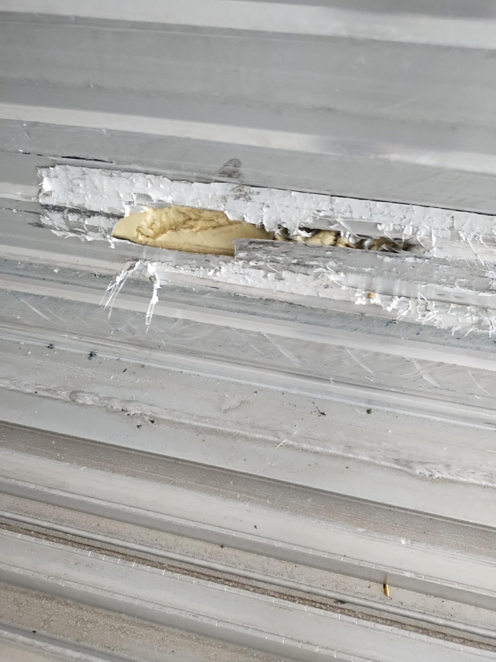 Wall insulation exposed